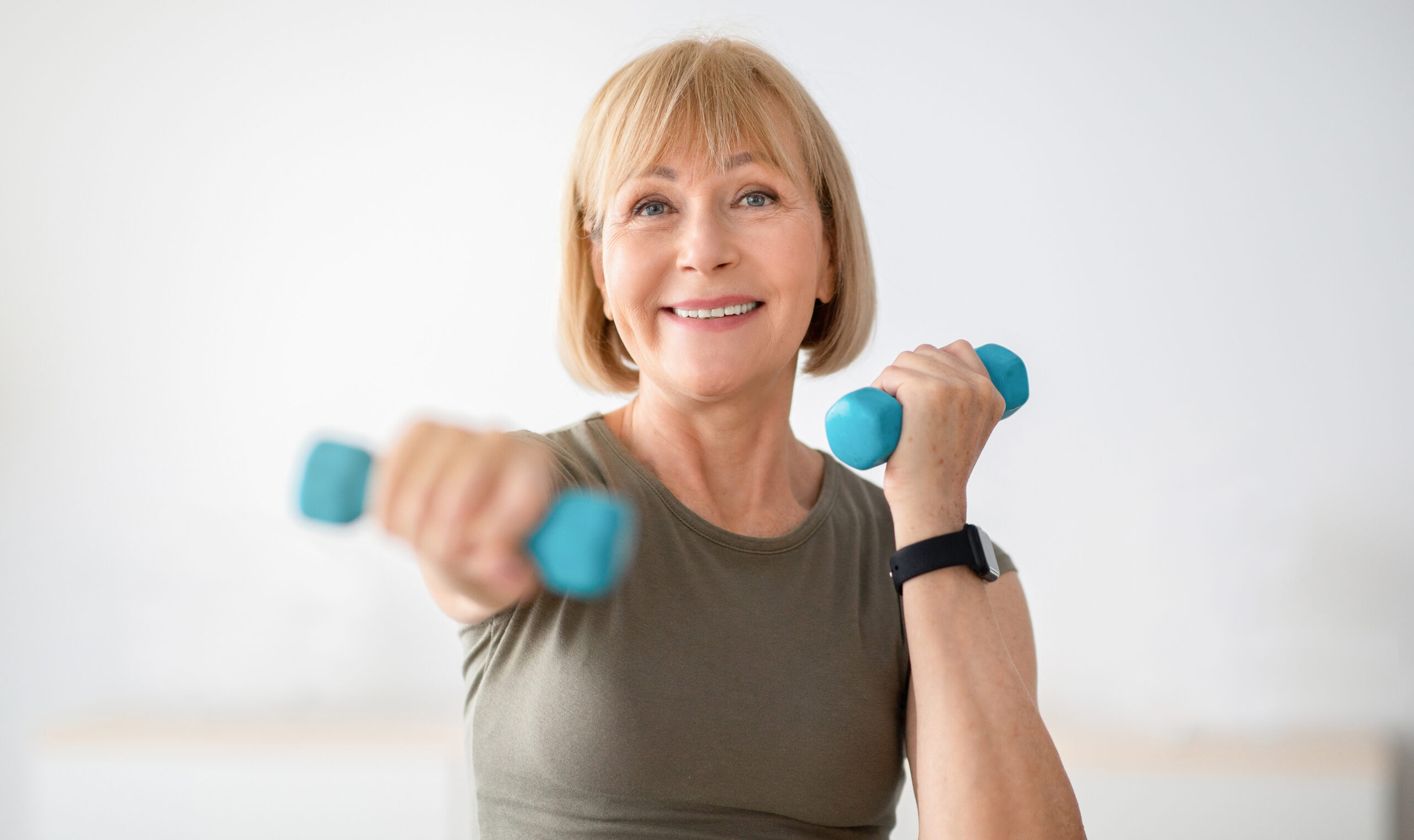 Home,Training,Concept.,Strong,Senior,Woman,Doing,Exercises,With,Dumbbells