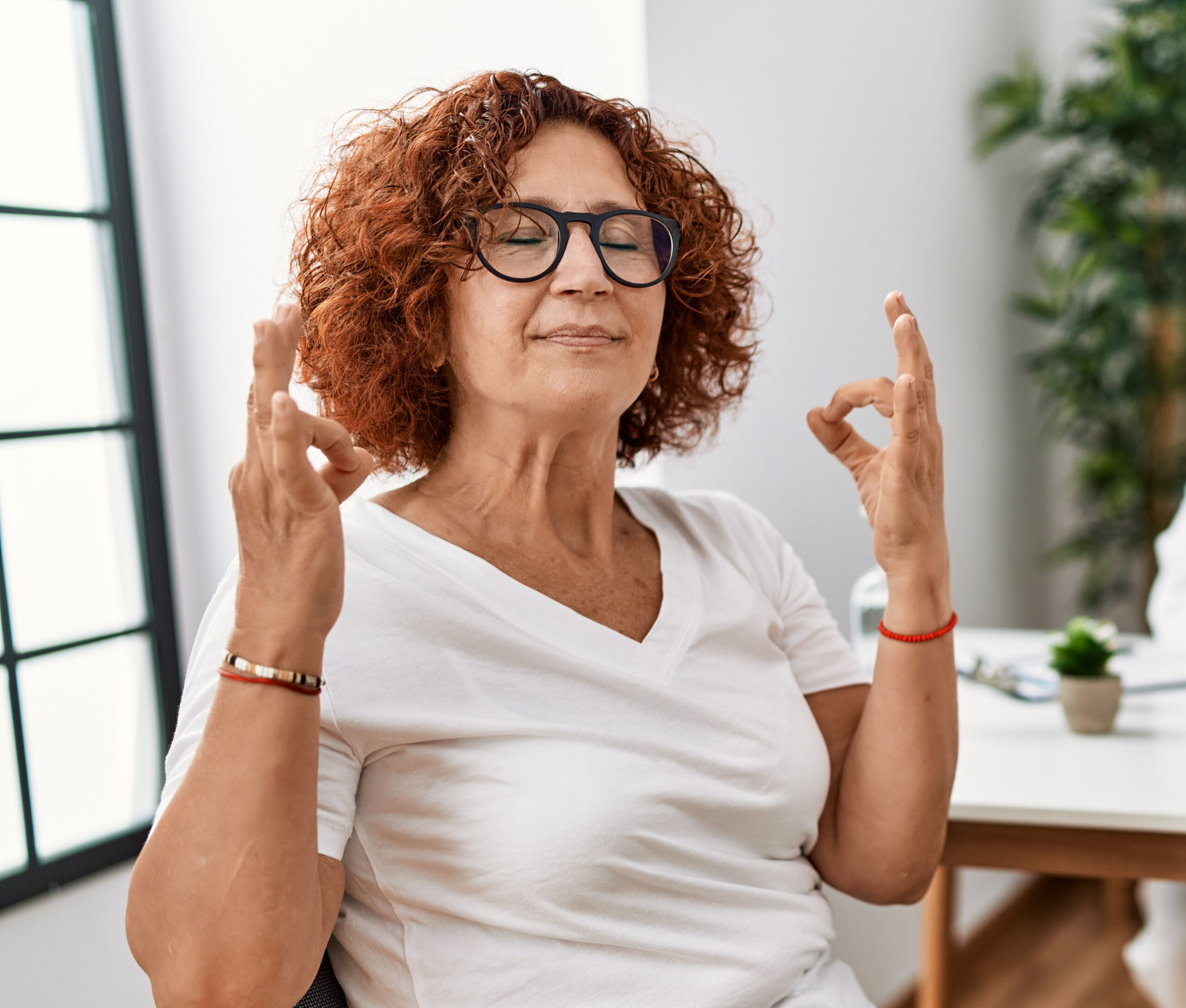 Senior,Woman,Sitting,At,Doctor,Appointment,Relax,And,Smiling,With